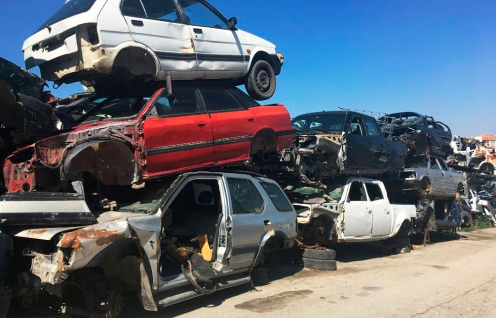 Cars on the Junkyard Waiting for Recycling